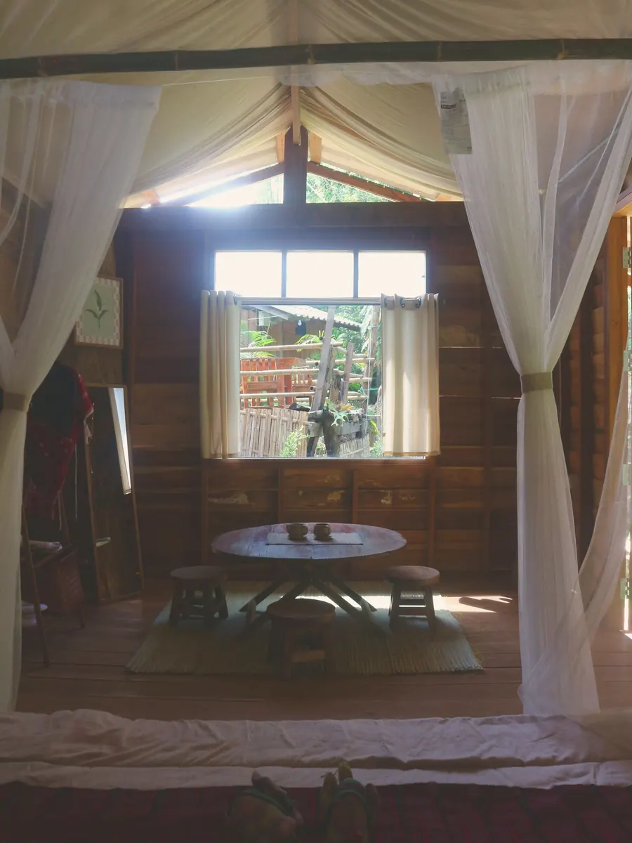 Room with low table and window to the garden